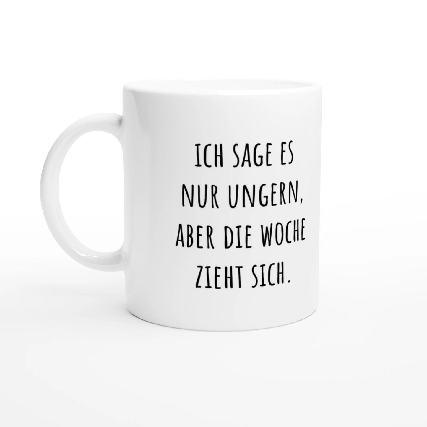 Weiße Keramiktasse 325 ml mit Aufdruck "Ich sage es nur ungern, aber die Woche zieht sich" – Schreibtischtasse von Vollzeitfrust, Ansicht von links
