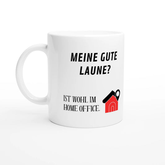 Weiße Keramiktasse 325 ml mit Aufdruck "Meine gute Laune? Ist wohl im Home Office" – Schreibtischtasse von Vollzeitfrust, Ansicht von links