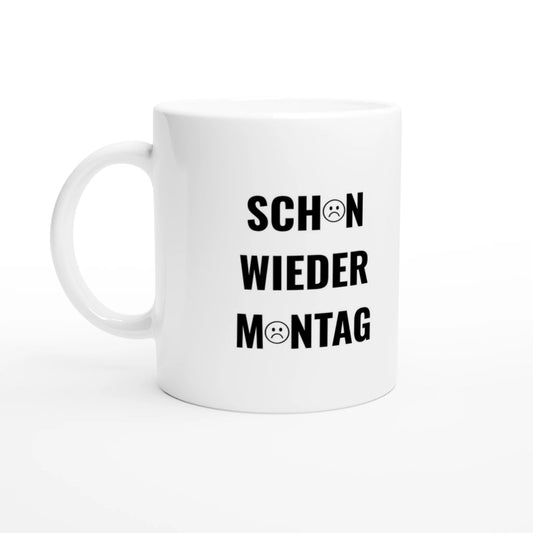 Weiße Keramiktasse 325 ml mit Aufdruck "Sch😟n wieder M😟ntag" – Schreibtischtasse von Vollzeitfrust, Ansicht von links