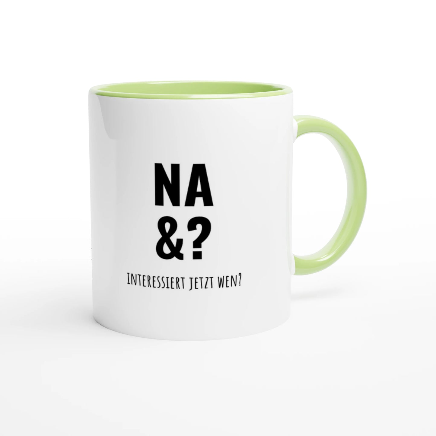 Zweifarbige Keramiktasse 325 ml mit Aufdruck "Na &? Interessiert jetzt wen?" in Grün – Schreibtischtasse von Vollzeitfrust