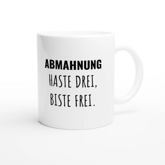 Weiße Keramiktasse 325 ml mit Aufdruck "Abmahnung – haste drei, biste frei" – Schreibtischtasse von Vollzeitfrust, Ansicht von rechts
