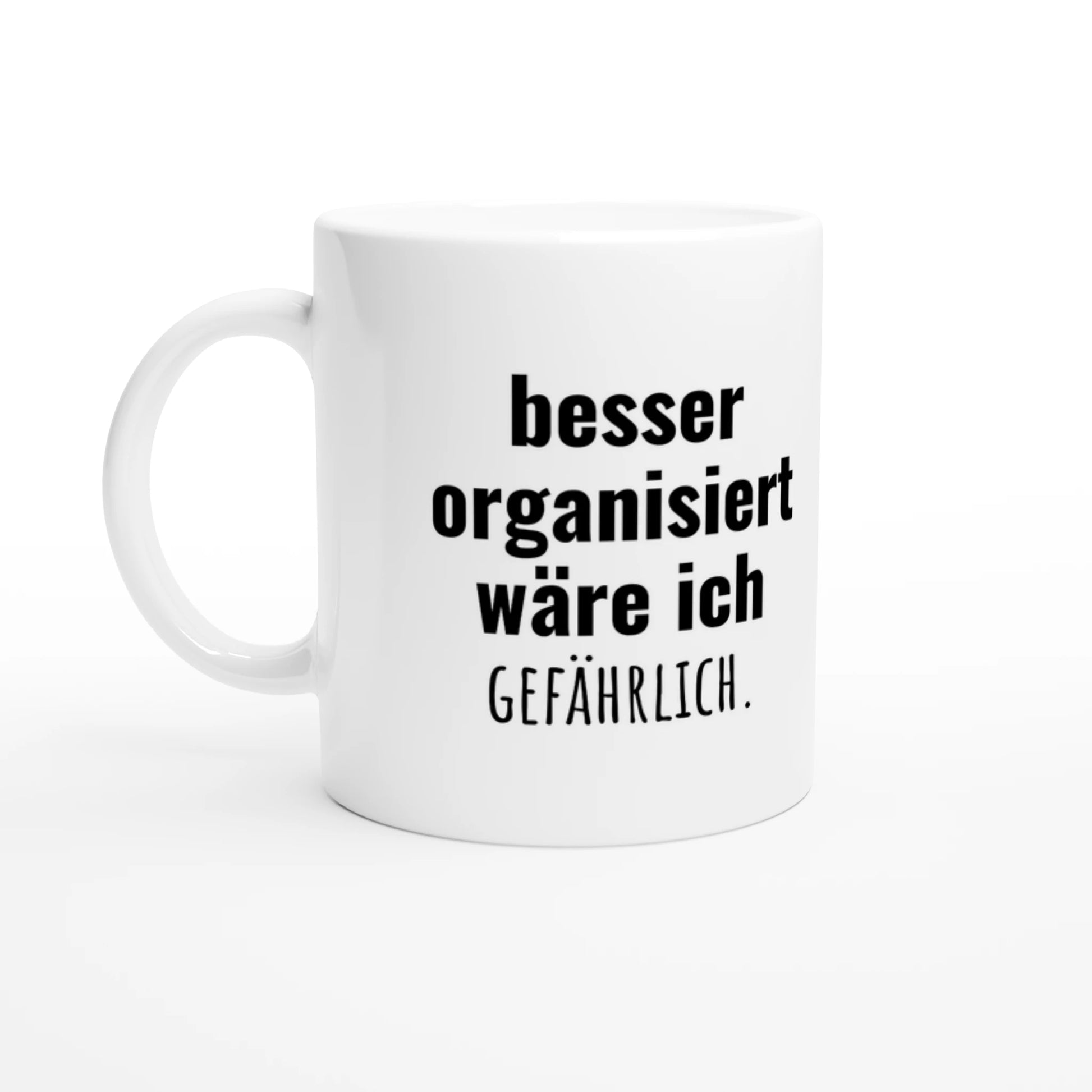 Weiße Keramiktasse 325 ml mit Aufdruck "besser organisiert wäre ich gefährlich" – Schreibtischtasse von Vollzeitfrust, Ansicht von links
