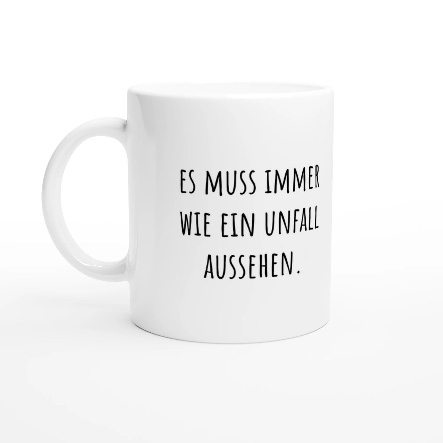 Weiße Keramiktasse 325 ml mit Aufdruck "Es muss immer wie ein Unfall aussehen" – Schreibtischtasse von Vollzeitfrust, Ansicht von links
