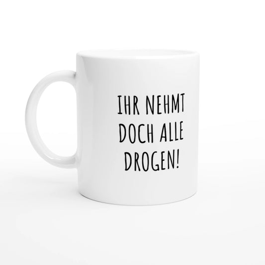 Weiße Keramiktasse 325 ml mit Aufdruck "Ihr nehmt doch alle Drogen!" – Schreibtischtasse von Vollzeitfrust, Ansicht von links
