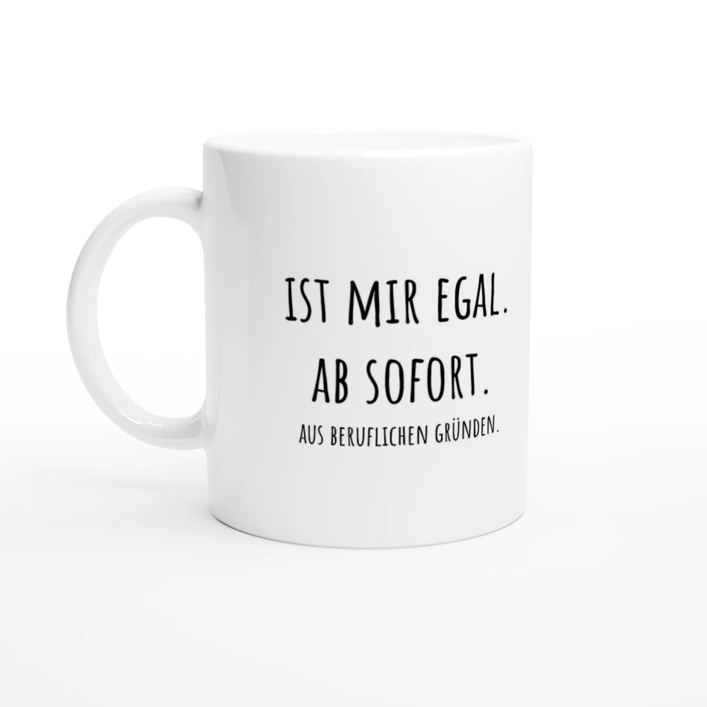 Weiße Keramiktasse 325 ml mit Aufdruck "Ist mir egal" – Schreibtischtasse von Vollzeitfrust, Ansicht von links
