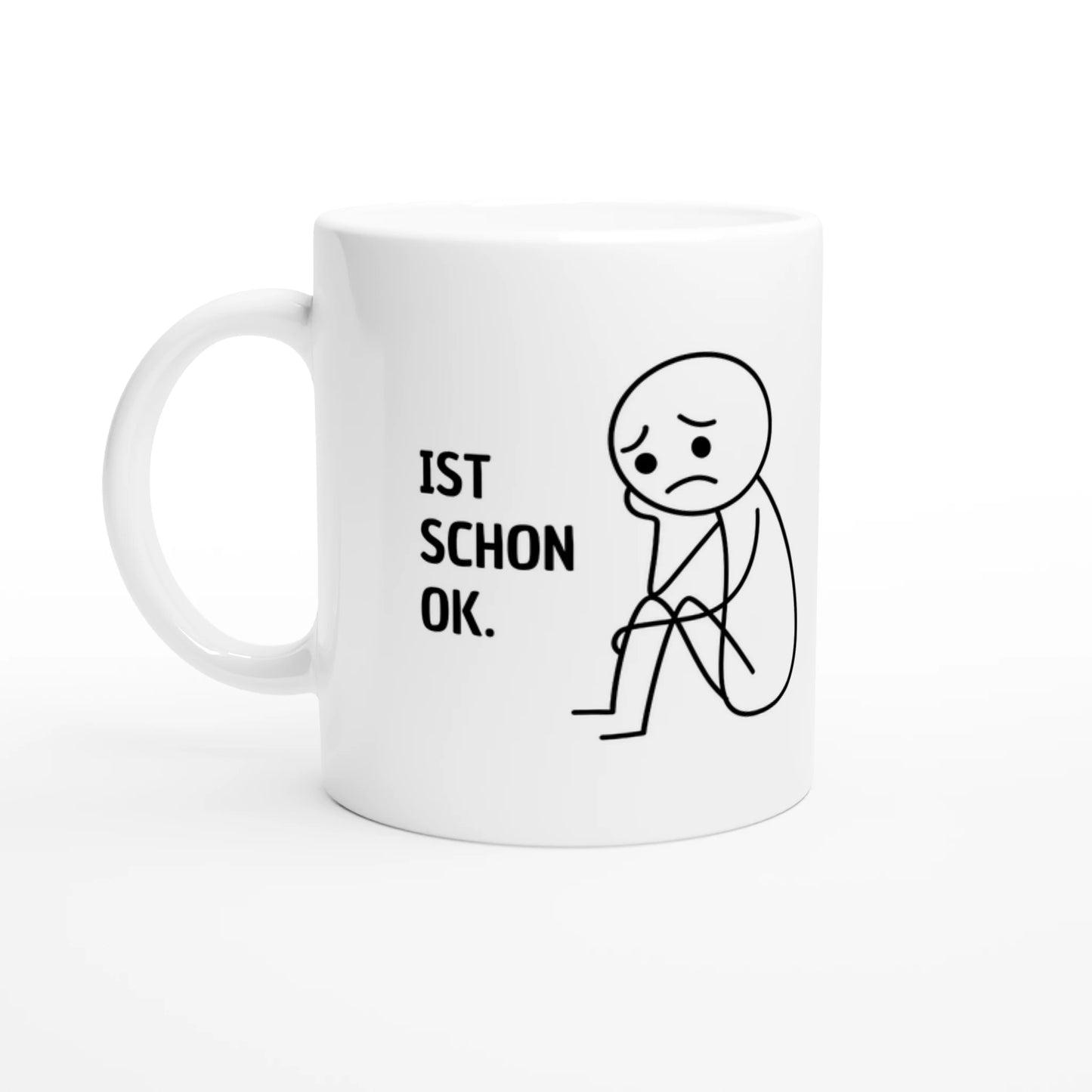 Weiße Keramiktasse 325 ml mit Aufdruck "Ist schon ok" – Schreibtischtasse von Vollzeitfrust, Ansicht von links
