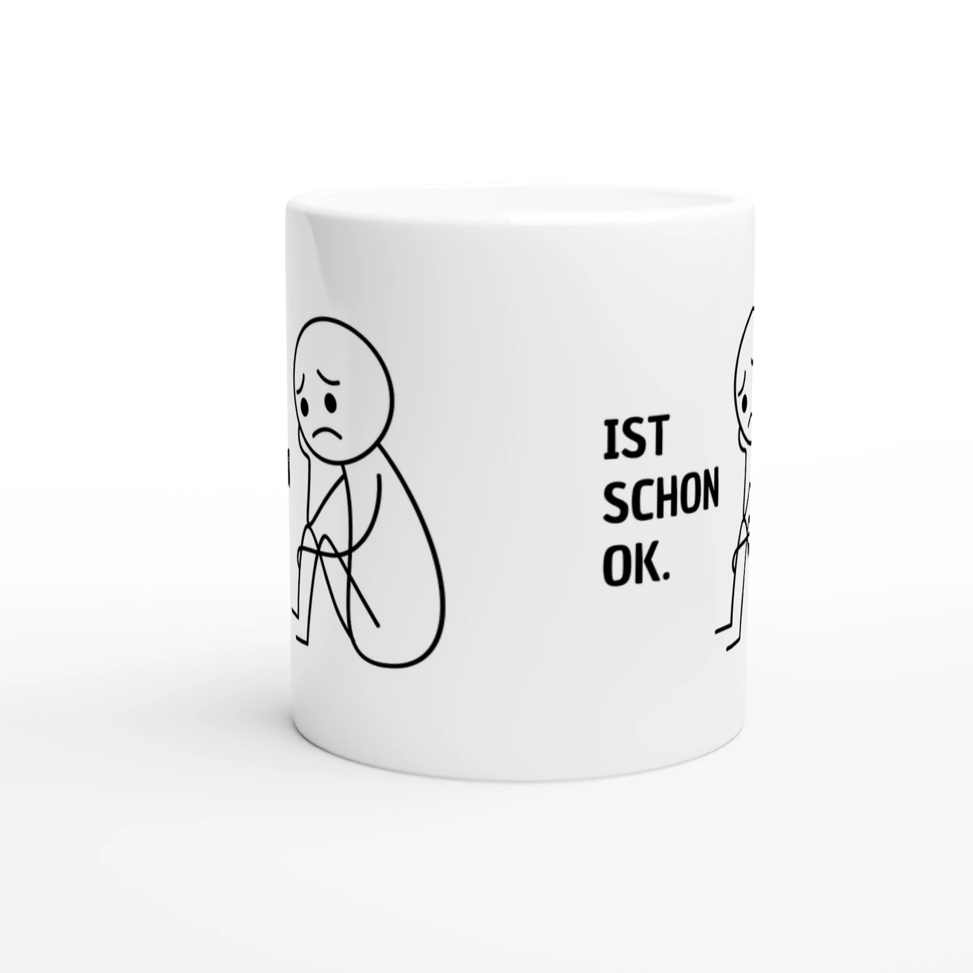 Weiße Keramiktasse mit Aufdruck "Ist schon ok" – Rundumsicht der Bürotasse von Vollzeitfrust