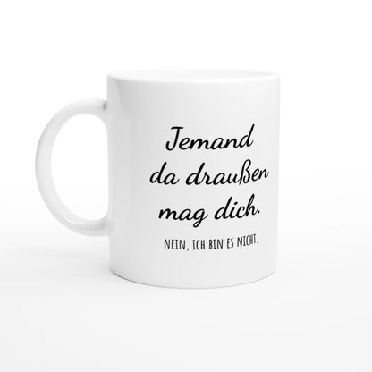 Weiße Keramiktasse 325 ml mit Aufdruck "Jemand da draußen mag dich" – Schreibtischtasse von Vollzeitfrust, Ansicht von links
