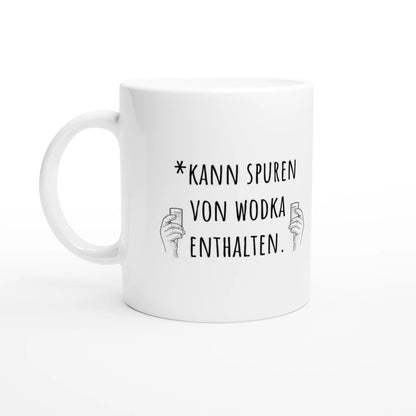 Weiße Keramiktasse 325 ml mit Aufdruck "*Kann Spuren von Wodka enthalten" – Schreibtischtasse von Vollzeitfrust, Ansicht von links