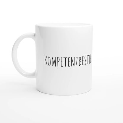 Weiße Keramiktasse 325 ml mit Aufdruck "Kompetenzbestie" – Schreibtischtasse von Vollzeitfrust, Ansicht von links
