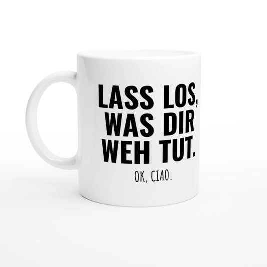 Weiße Keramiktasse 325 ml mit Aufdruck "Lass los, was dir weh tut" – Schreibtischtasse von Vollzeitfrust, Ansicht von links
