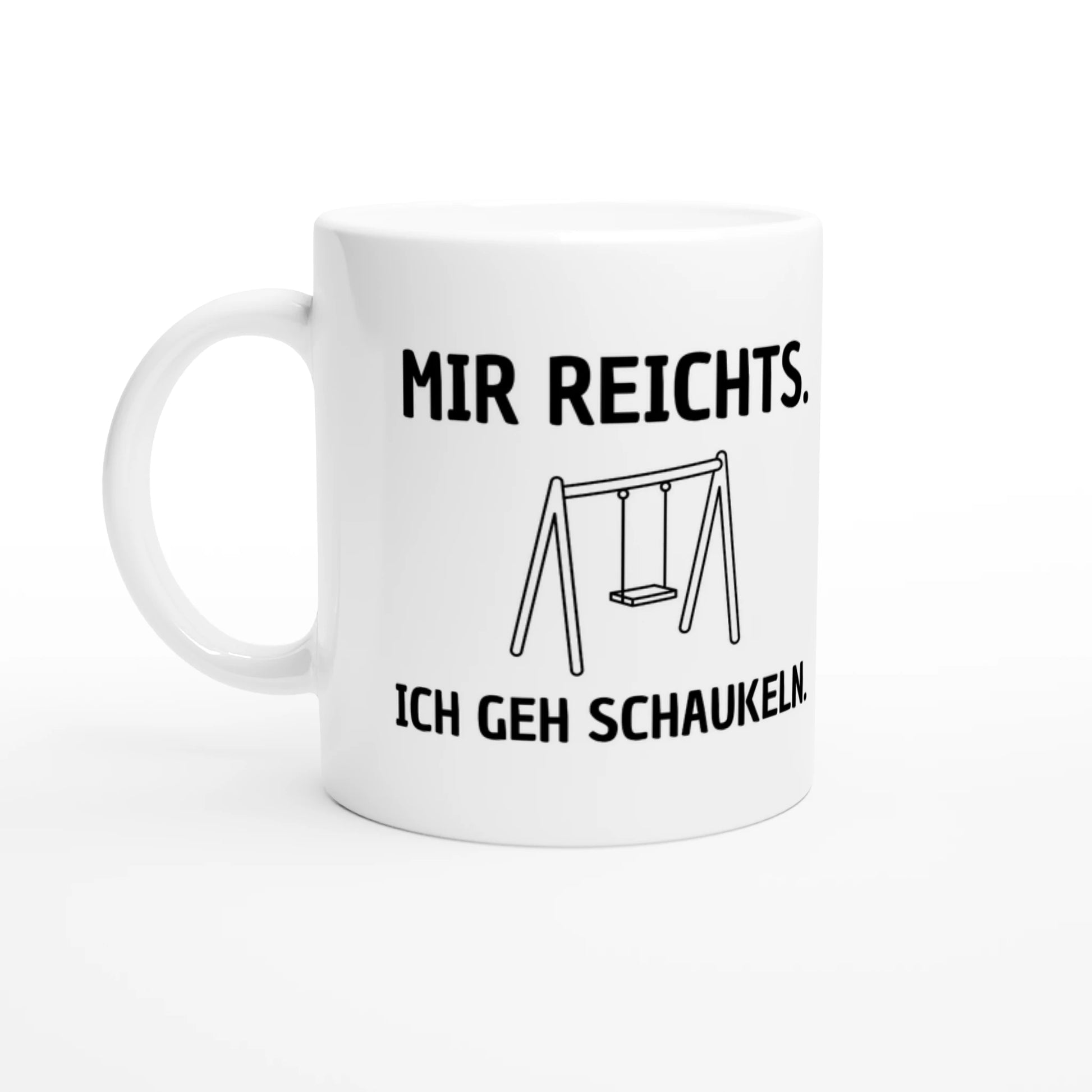Weiße Keramiktasse 325 ml mit Aufdruck "Mir reichts. Ich geh schaukeln" – Schreibtischtasse von Vollzeitfrust, Ansicht von links