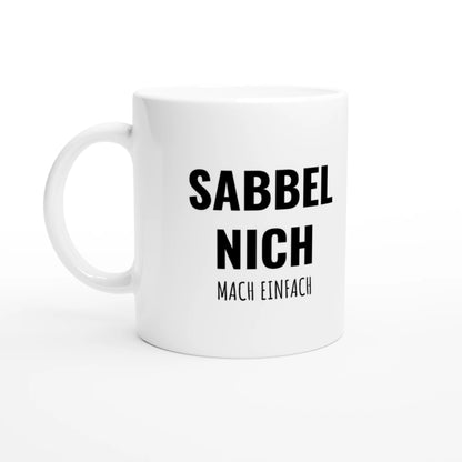 Weiße Keramiktasse 325 ml mit Aufdruck "Sabbel nich – Mach einfach" – Schreibtischtasse von Vollzeitfrust, Ansicht von links
