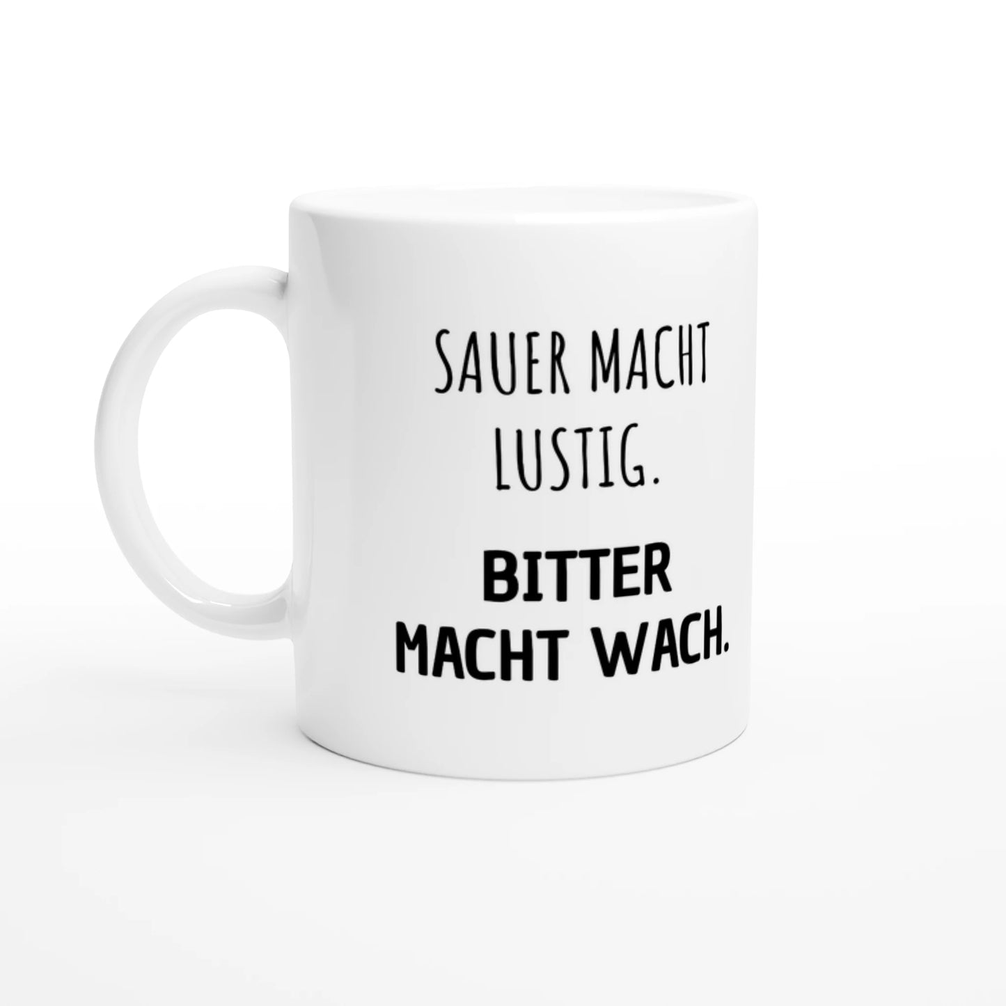 Weiße Keramiktasse 325 ml mit Aufdruck "Sauer macht lustig. Bitter macht wach" – Schreibtischtasse von Vollzeitfrust, Ansicht von links