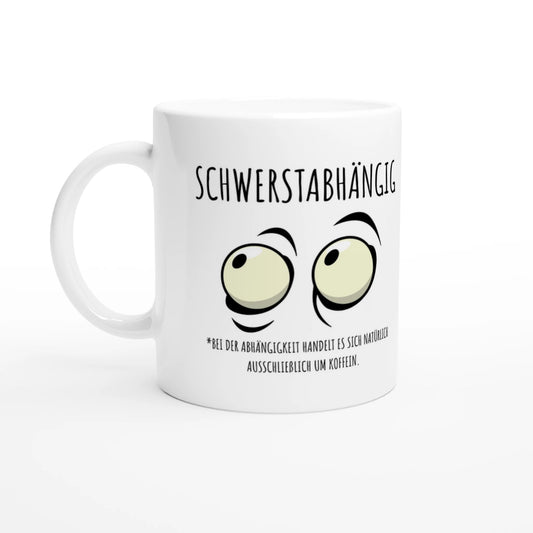 Weiße Keramiktasse 325 ml mit Aufdruck "Schwerstabhängig" – Schreibtischtasse von Vollzeitfrust, Ansicht von links
