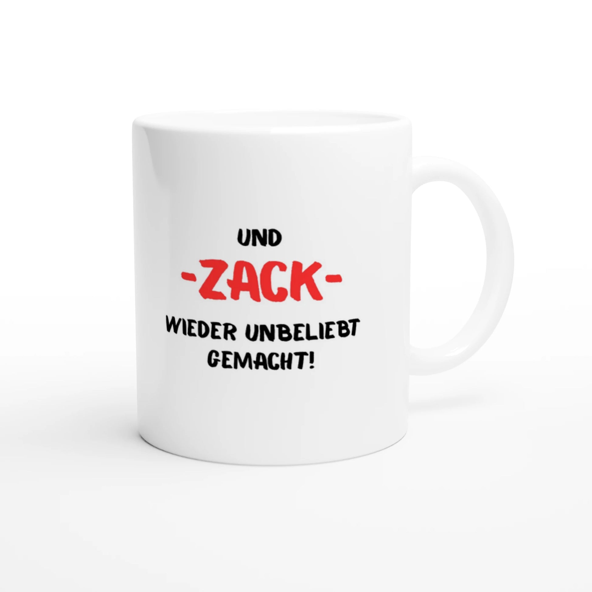 Weiße Keramiktasse 325 ml mit Aufdruck "Und – ZACK – wieder unbeliebt gemacht!" – Schreibtischtasse von Vollzeitfrust, Ansicht von rechts