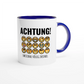 Zweifarbige Keramiktasse 325 ml mit Aufdruck "Achtung! Emotional völlig instabil" in Blau – Schreibtischtasse von Vollzeitfrust
