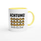 Zweifarbige Keramiktasse 325 ml mit Aufdruck "Achtung! Emotional völlig instabil" in Gelb – Schreibtischtasse von Vollzeitfrust
