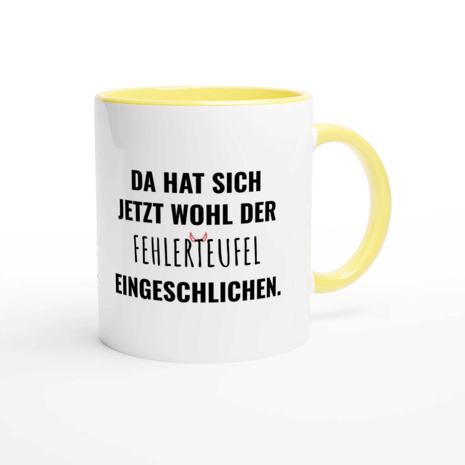 Zweifarbige Keramiktasse 325 ml mit Aufdruck "Da hat sich jetzt wohl der Fehlerteufel eingeschlichen" in Gelb – Schreibtischtasse von Vollzeitfrust
