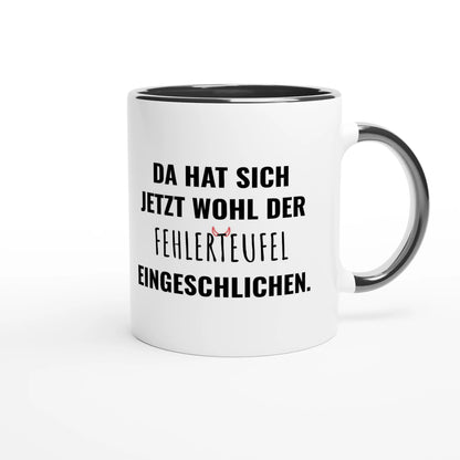 Zweifarbige Keramiktasse 325 ml mit Aufdruck "Da hat sich jetzt wohl der Fehlerteufel eingeschlichen" in Schwarz – Schreibtischtasse von Vollzeitfrust
