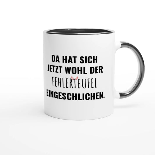 Zweifarbige Keramiktasse 325 ml mit Aufdruck "Da hat sich jetzt wohl der Fehlerteufel eingeschlichen" in Schwarz – Schreibtischtasse von Vollzeitfrust
