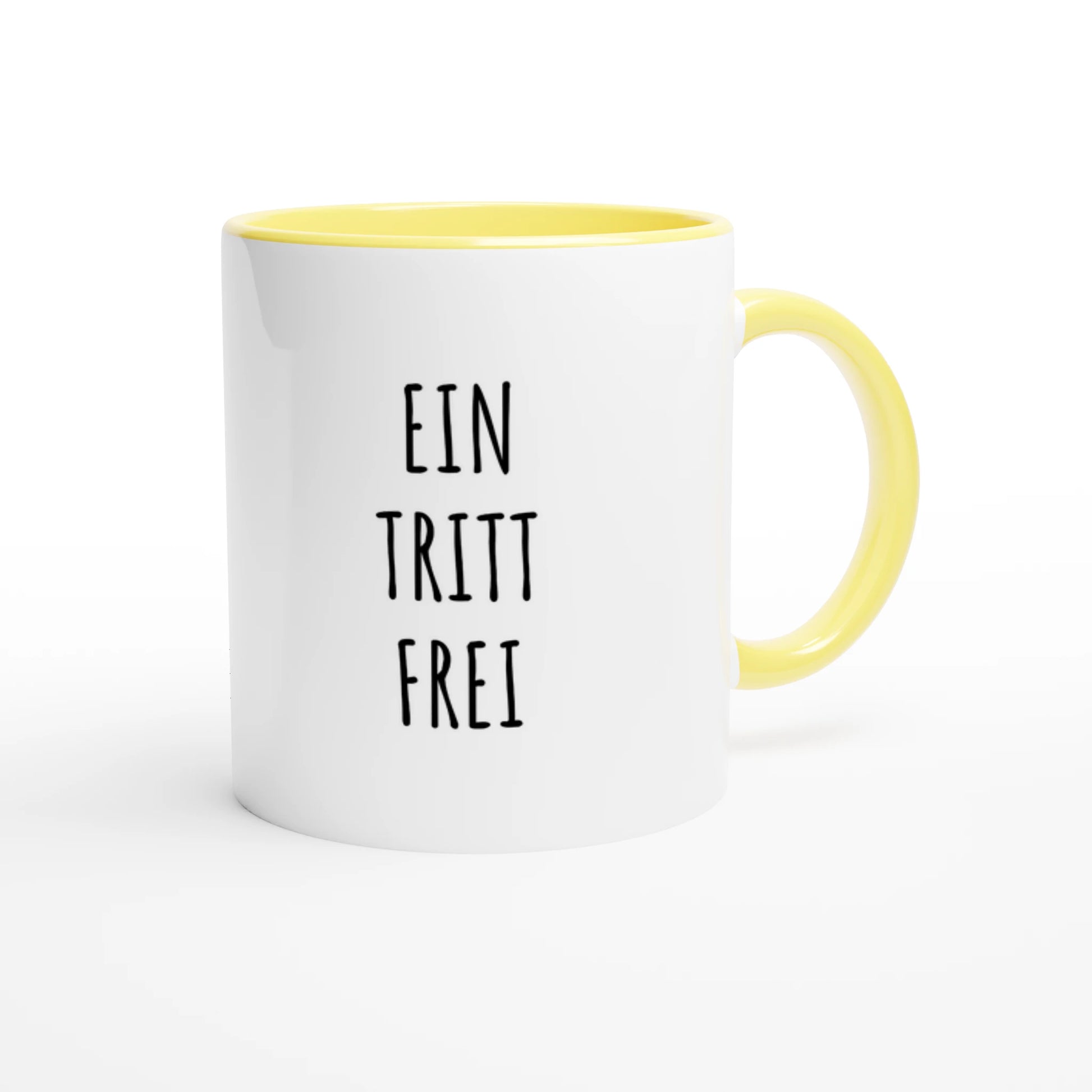 Zweifarbige Keramiktasse 325 ml mit Aufdruck "Ein Tritt frei" in Gelb – Schreibtischtasse von Vollzeitfrust

