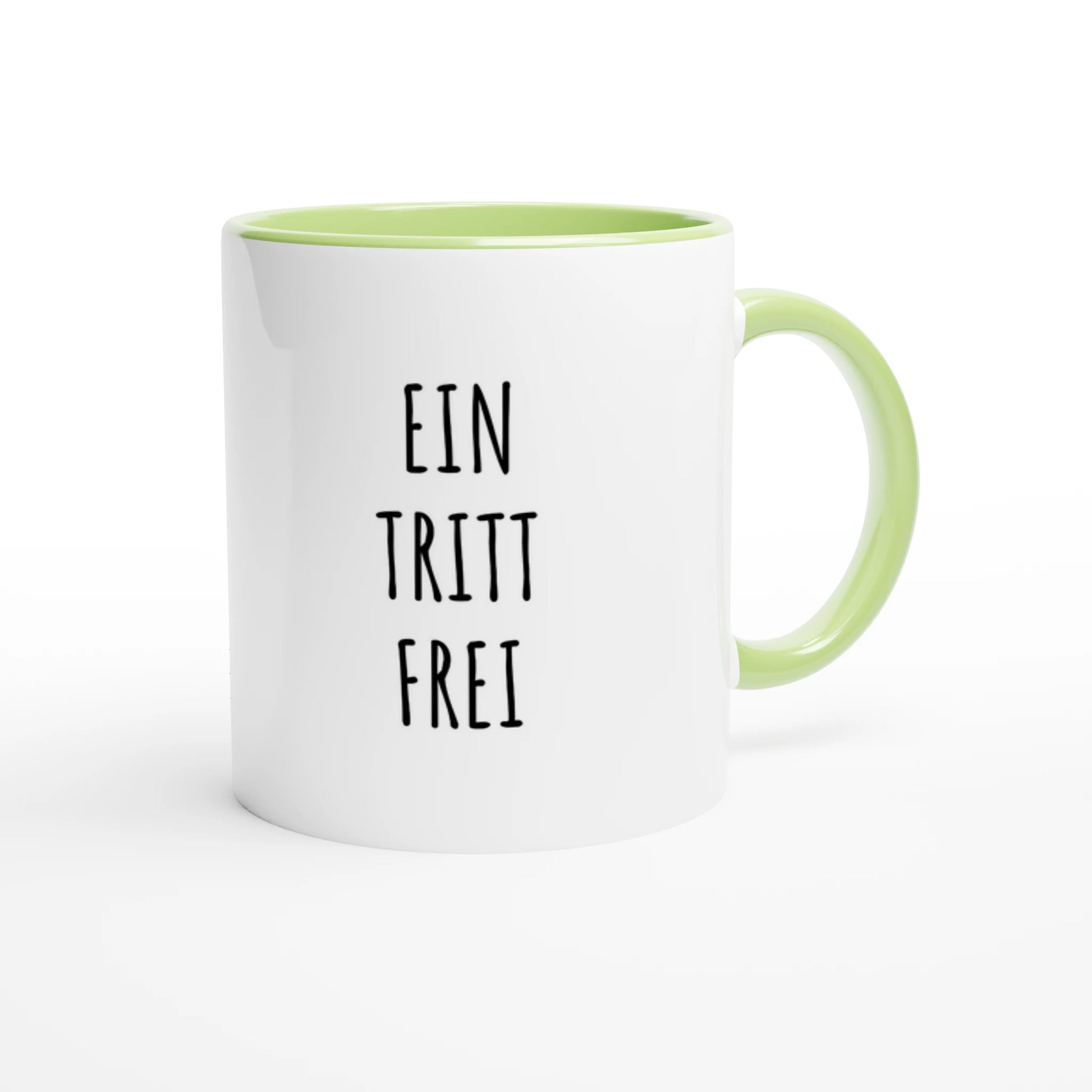 Zweifarbige Keramiktasse 325 ml mit Aufdruck "Ein Tritt frei" in Grün – Schreibtischtasse von Vollzeitfrust
