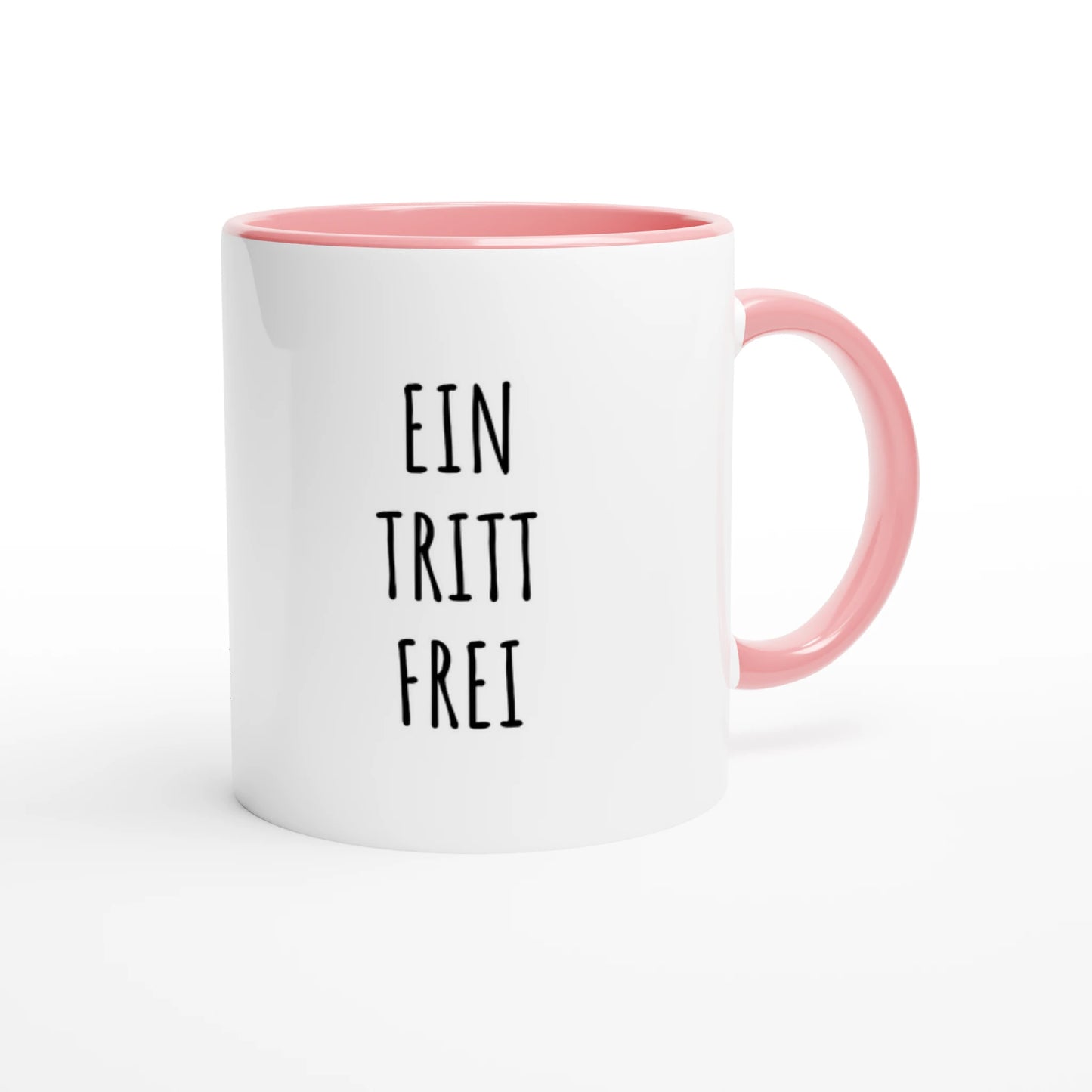 Zweifarbige Keramiktasse 325 ml mit Aufdruck "Ein Tritt frei" in Rosa – Schreibtischtasse von Vollzeitfrust
