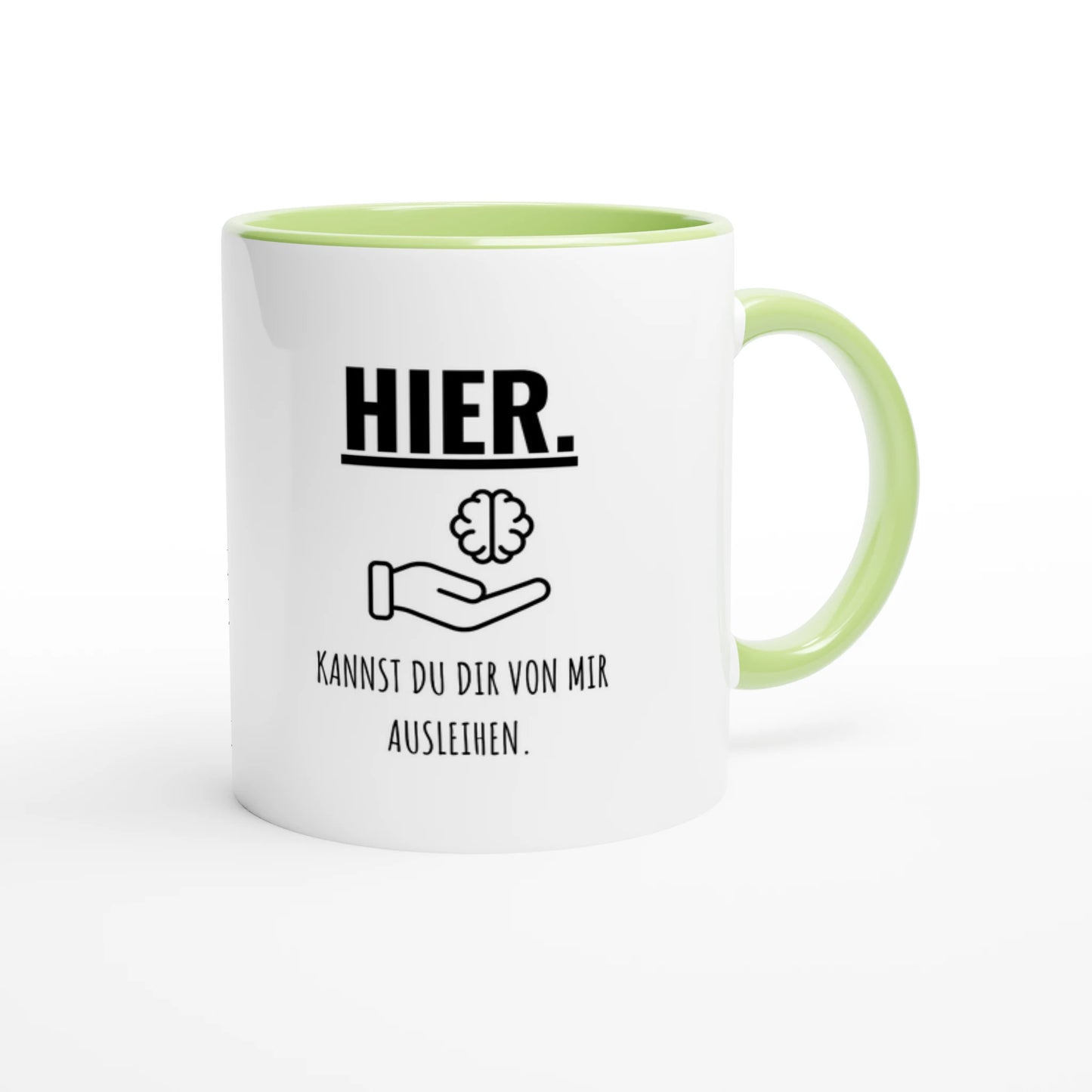 Zweifarbige Keramiktasse 325 ml mit Aufdruck "Hier. Kannst du dir von mir ausleihen" in Grün – Schreibtischtasse von Vollzeitfrust
