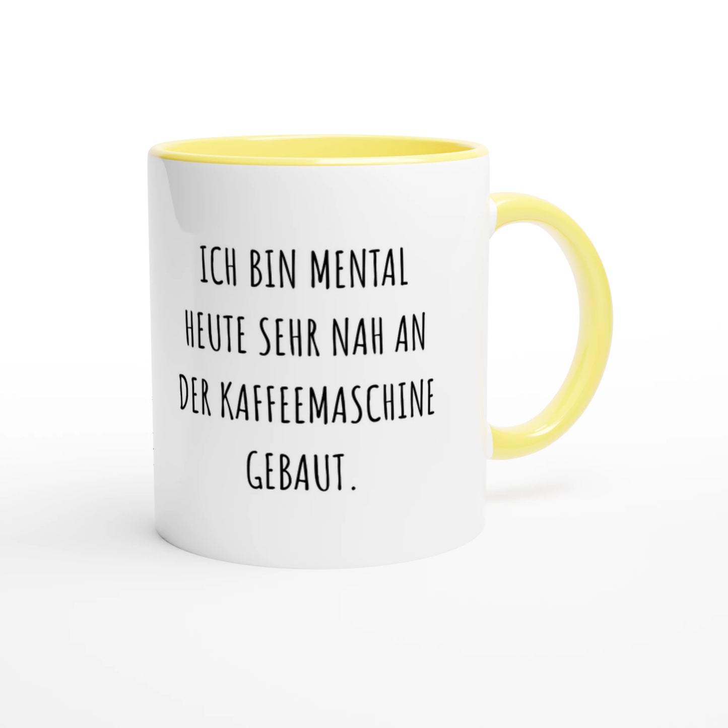 Zweifarbige Keramiktasse 325 ml mit Aufdruck "Ich bin mental heute sehr nah an der Kaffeemaschine gebaut" in Gelb – Schreibtischtasse von Vollzeitfrust
