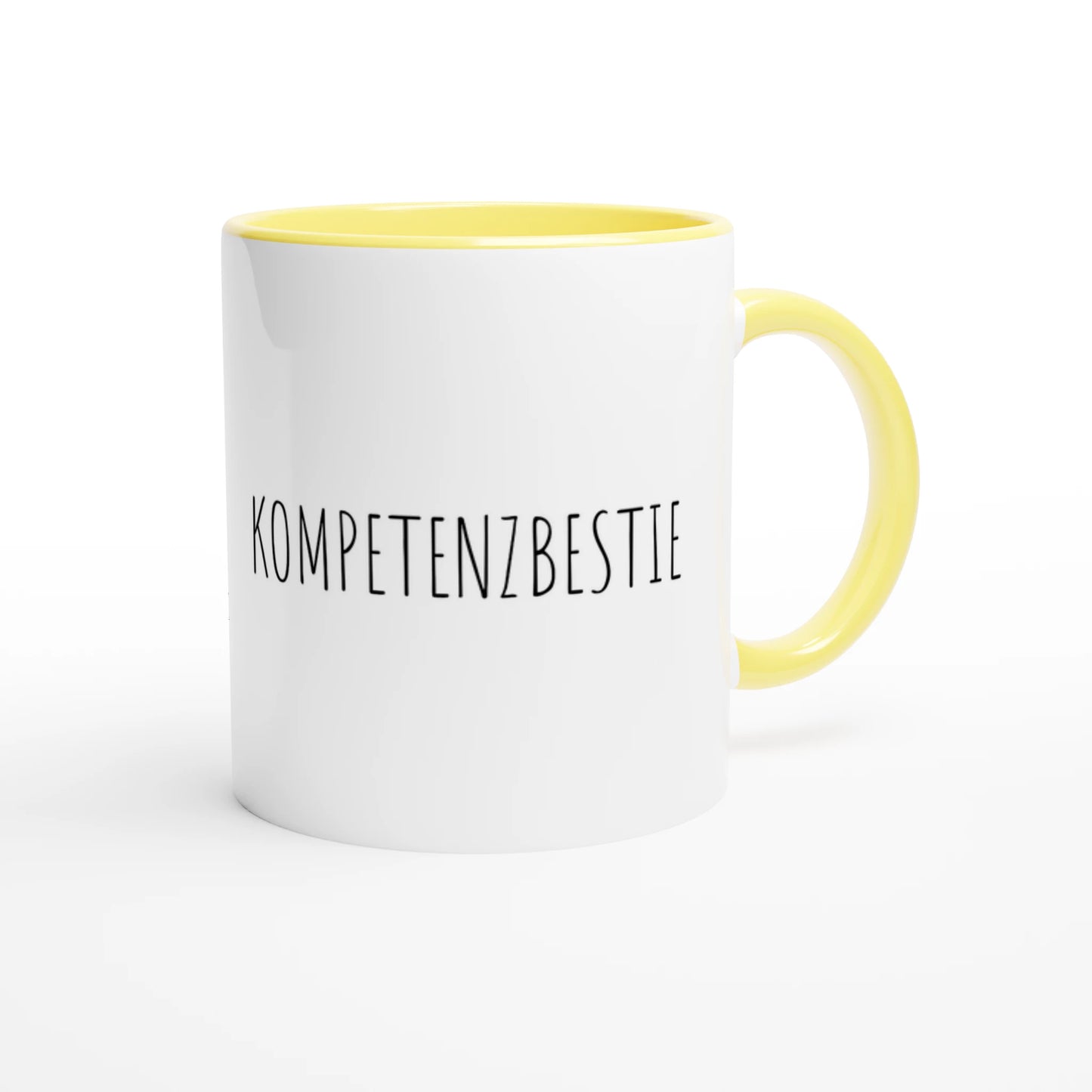 Zweifarbige Keramiktasse 325 ml mit Aufdruck "Kompetenzbestie" in Gelb – Schreibtischtasse von Vollzeitfrust