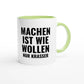 Zweifarbige Keramiktasse 325 ml mit Aufdruck "Machen ist wie Wollen. Nur krasser" in Grün – Schreibtischtasse von Vollzeitfrust
