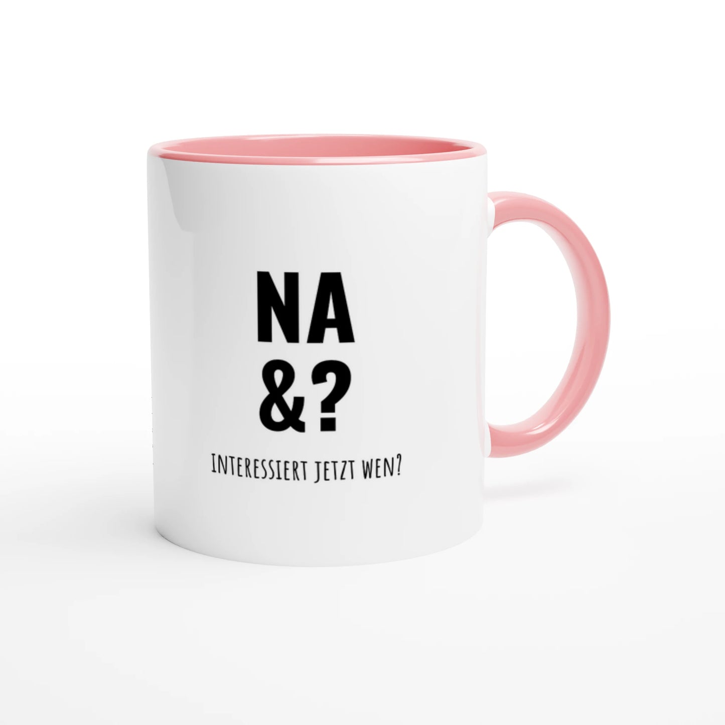 Zweifarbige Keramiktasse 325 ml mit Aufdruck "Na &? Interessiert jetzt wen?" in Rosa – Schreibtischtasse von Vollzeitfrust
