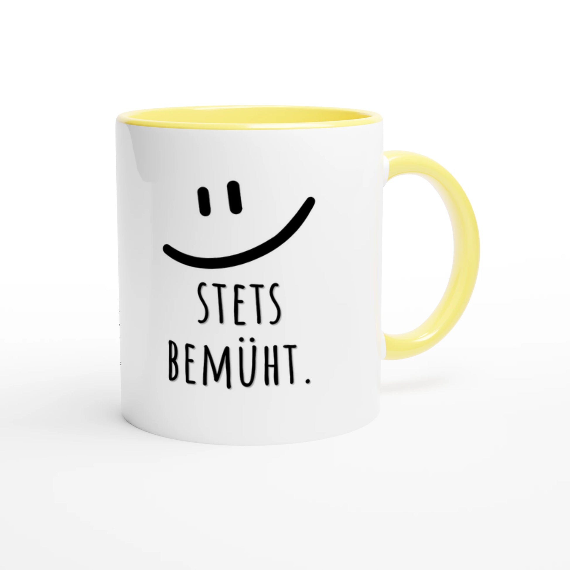 Zweifarbige Keramiktasse 325 ml mit Aufdruck "Stets bemüht" in Gelb – Schreibtischtasse von Vollzeitfrust
