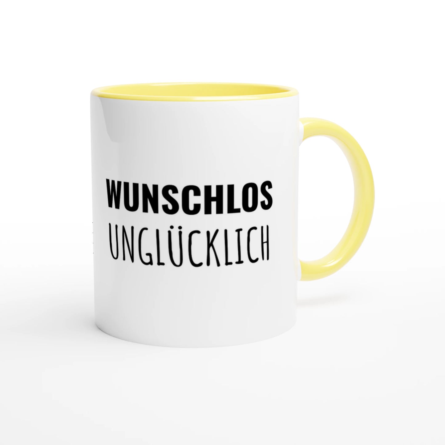 Zweifarbige Keramiktasse 325 ml mit Aufdruck "Wunschlos unglücklich" in Gelb – Schreibtischtasse von Vollzeitfrust
